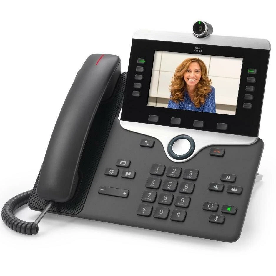 Cisco 8865 IP video phone on office desk with handset and display on